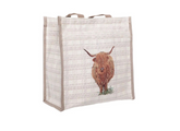 Reusable shopping bag with a highland cow design on a white background