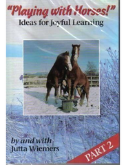 Cover of 'Playing with Horses! Ideas for Joyful Learning, Part 2' by Jutta Wiemers, featuring two horses with a winter landscape in the background.
