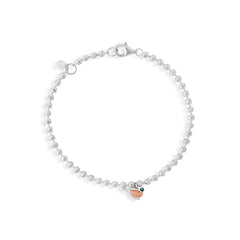 A sterling silver bracelet with a rose gold and enamel detailed pheasant charm, and silver beads.