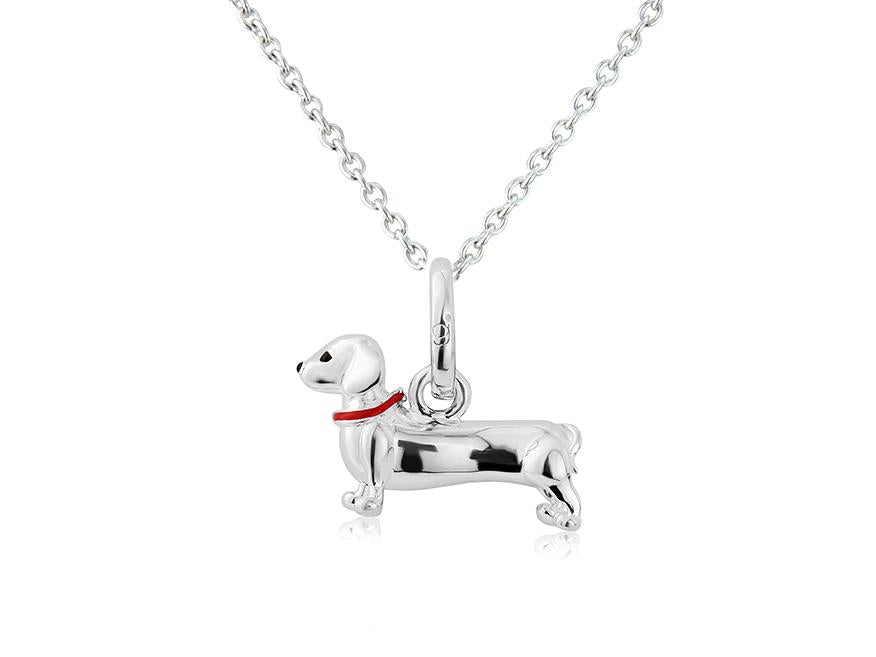 A sterling silver Dachshund dog pendant with a red enamel collar, attached to a silver chain.