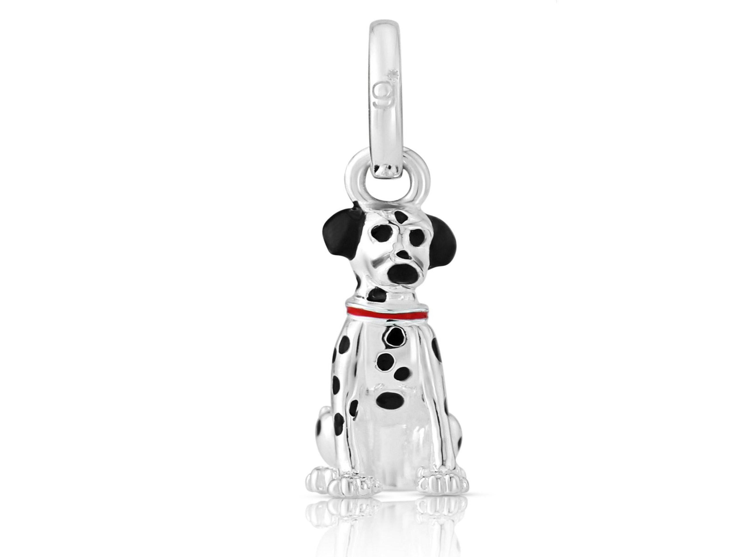 A sterling silver Dalmatian dog charm with black enamel spots and a red enamel collar.