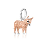 A sterling silver charm shaped like a donkey with a rose gold finish on parts of its body.
