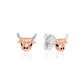 Rose gold and silver bull head earrings on a white background