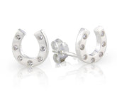 Silver hoop earrings with embedded stones on a white background
