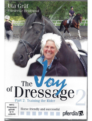 Cover of 'The Joy of Dressage Vol 2' featuring a woman with a horse, title text, and additional details about the DVD.