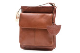 A brown leather sling shoulder bag with a front flap and buckle closure, displayed against a white background.