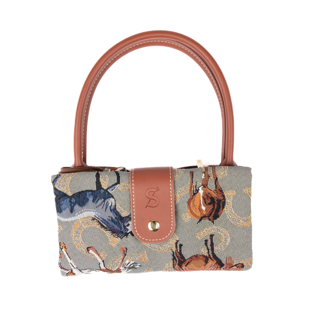 A foldaway Irish horse tapestry bag with a multicolored fabric and a brown faux leather handle.