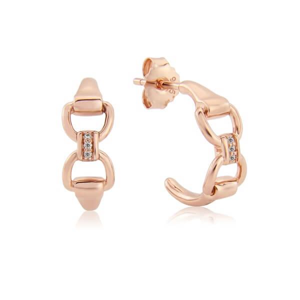 A pair of rose gold vermeil hoop earrings with cubic zirconia stones, designed to resemble a snaffle bit.