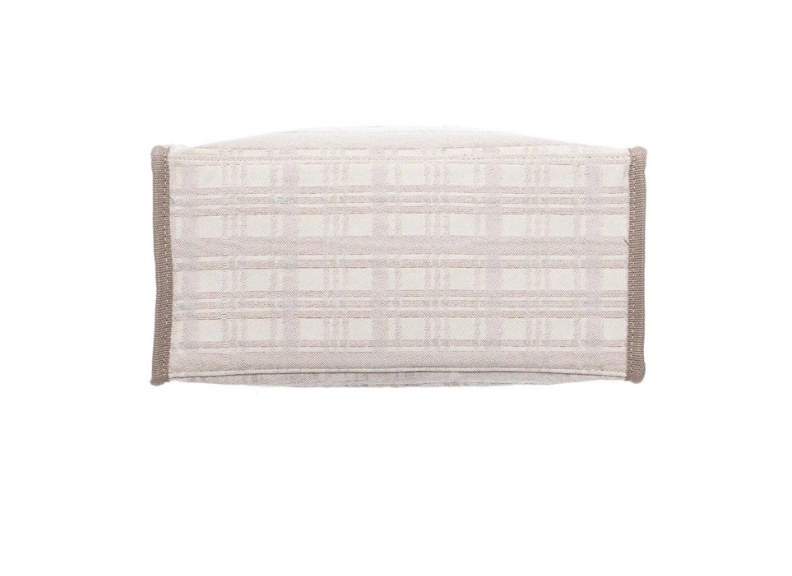 Rectangular woven mat with a striped pattern on a white background