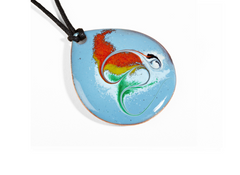 Colorful fish pendant on a white background