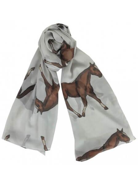 A light grey chiffon scarf with horse artwork displayed on a white background.