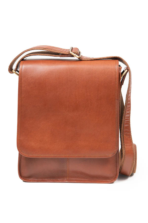 A soft tan Irish leather messenger bag with a long adjustable shoulder strap, displayed against a white background.