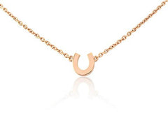 Rose gold vermeil mini horseshoe necklace on an adjustable chain, presented against a white background.