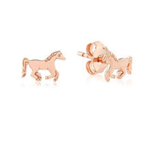 A pair of rose gold stud earrings in the shape of running ponies.