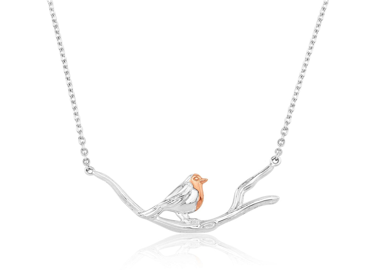Sterling silver necklace with a charm of a robin perched on a branch, with an adjustable chain.