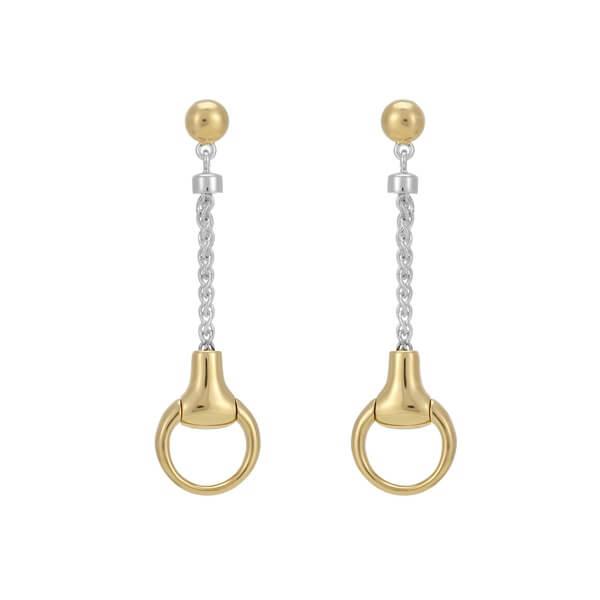 A pair of silver snaffle bit drop earrings with gold accents, featuring butterfly back closures, displayed against a white background.