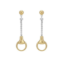 A pair of silver snaffle bit drop earrings with gold accents, featuring butterfly back closures, displayed against a white background.