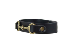 Black leather bridle horse bit-style belt with brass hardware on a white background