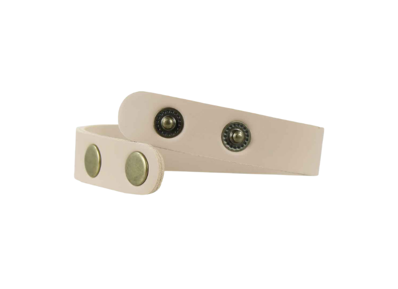 Two beige straps with metallic circular accents on a white background