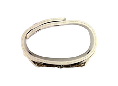 Silver ring with a white stone on a white background