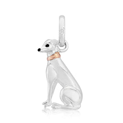 A sterling silver greyhound charm with a rose gold collar.