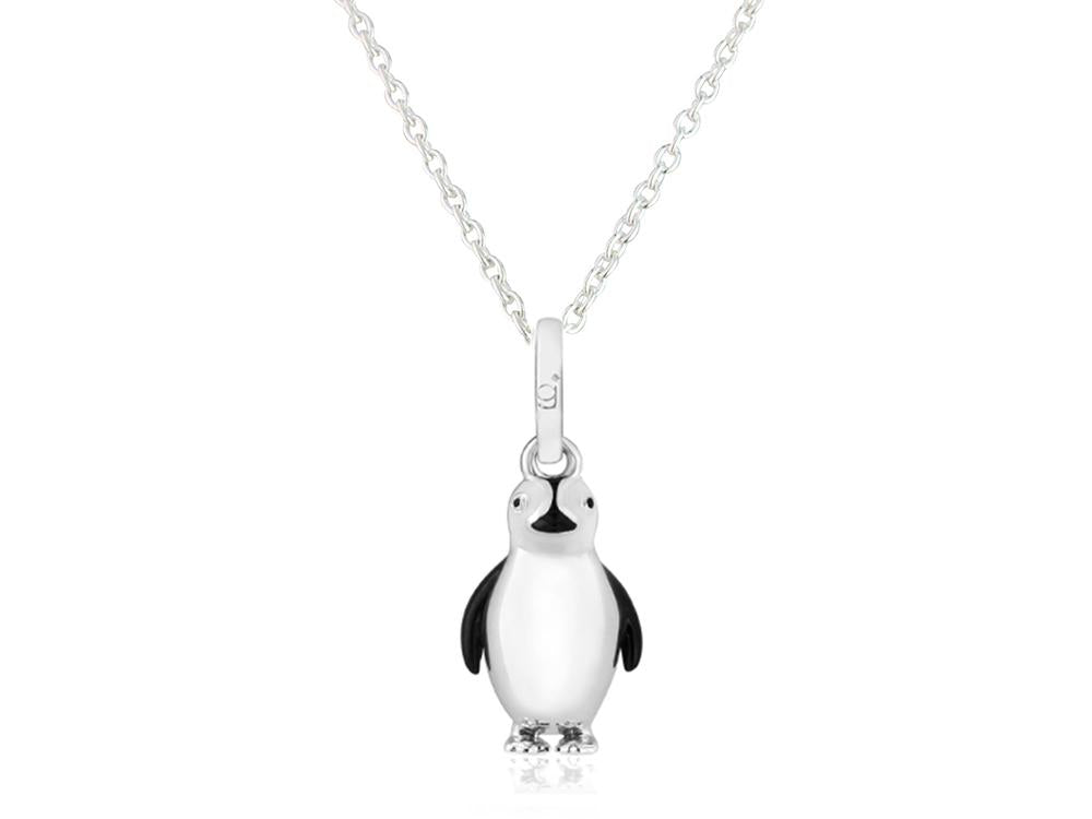 A sterling silver pendant in the shape of a penguin with black and white enamel detailing, attached to a silver chain.