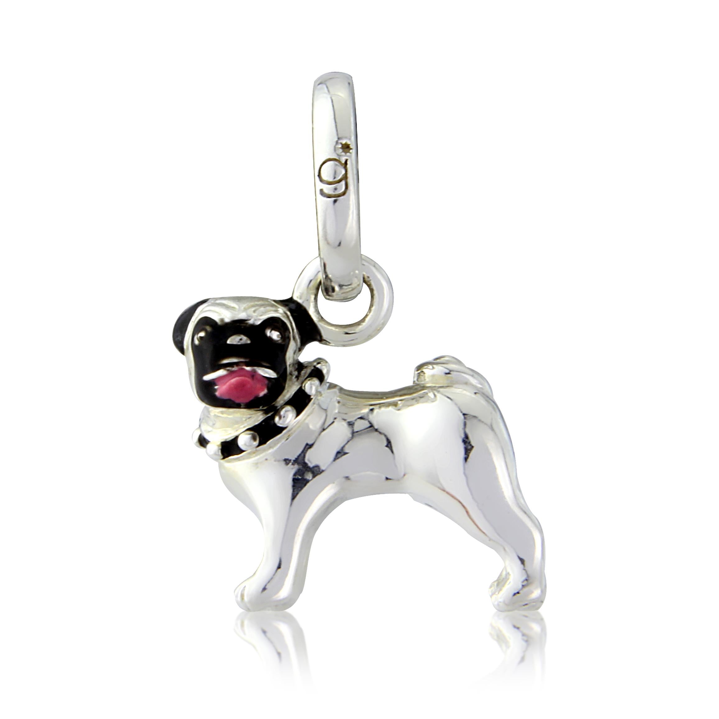A sterling silver charm in the shape of a Pug dog with black, pink, and white enamel markings, suspended from a loop.