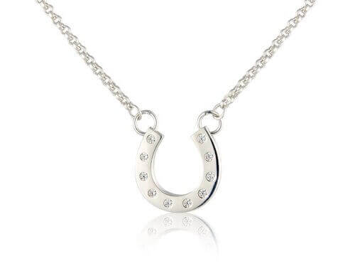 A sterling silver horseshoe necklace with sparkly cubic zirconia stones on a silver chain, displayed against a white background.