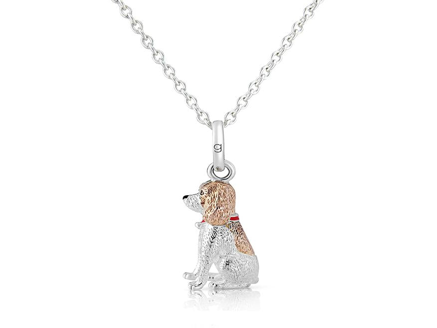 A sterling silver pendant in the shape of a Springer Spaniel dog with rose gold highlights, attached to a silver chain.