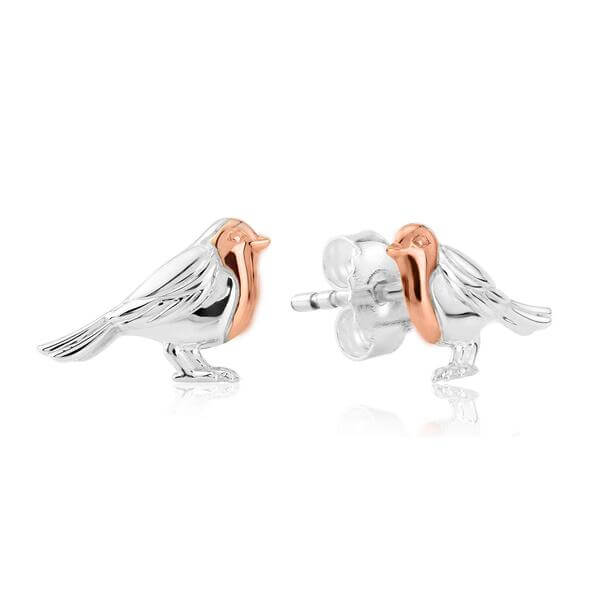A pair of silver and rose gold stud earrings in the shape of robins.