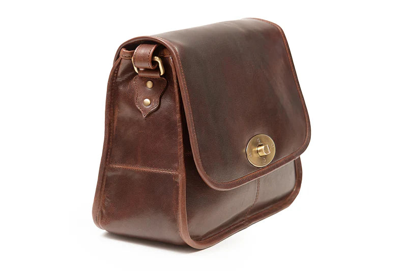 A soft dark brown leather shoulder bag with a flap closure and a metal buckle, showcasing the rich texture of the leather.