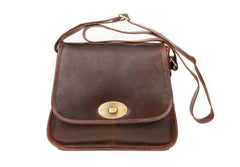 Biker bag in soft dark from leather front view with straps