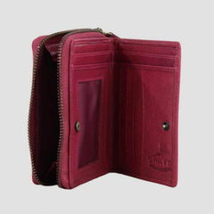 Pink leather purse open showing compartments for cards and cash