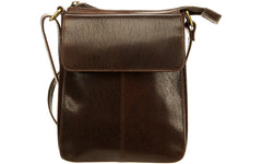 A brown leather shoulder bag with a flap closure and an adjustable crossbody strap.