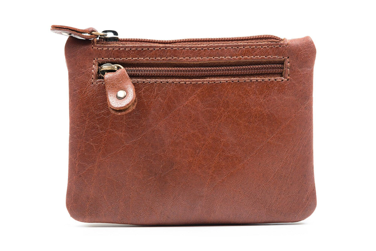 A closed three zip purse in soft tan Irish leather.