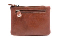 A closed three zip purse in soft tan Irish leather.