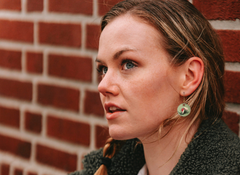 CELTIC GREEN ENAMEL DROP EARRINGS.