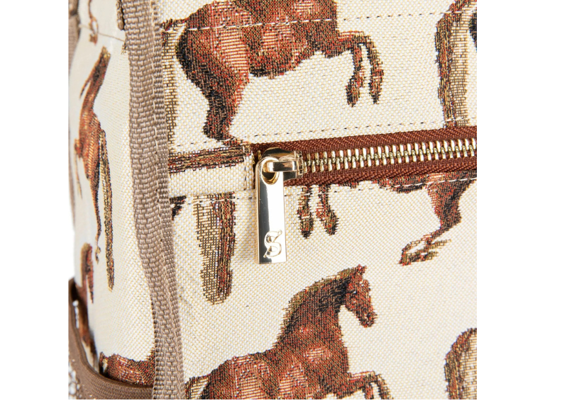 Cosmetic bag with horse pattern and gold zipper on beige background