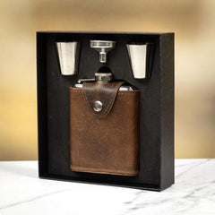 brown leather whiskey hip flask in presentation black box with 2 shot cups