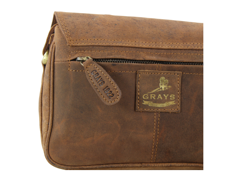 Close up hunter leather bag with grays logo and zip compartment
