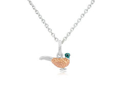A sterling silver pendant in the shape of a pheasant, displayed on a chain with a velvet gift pouch.